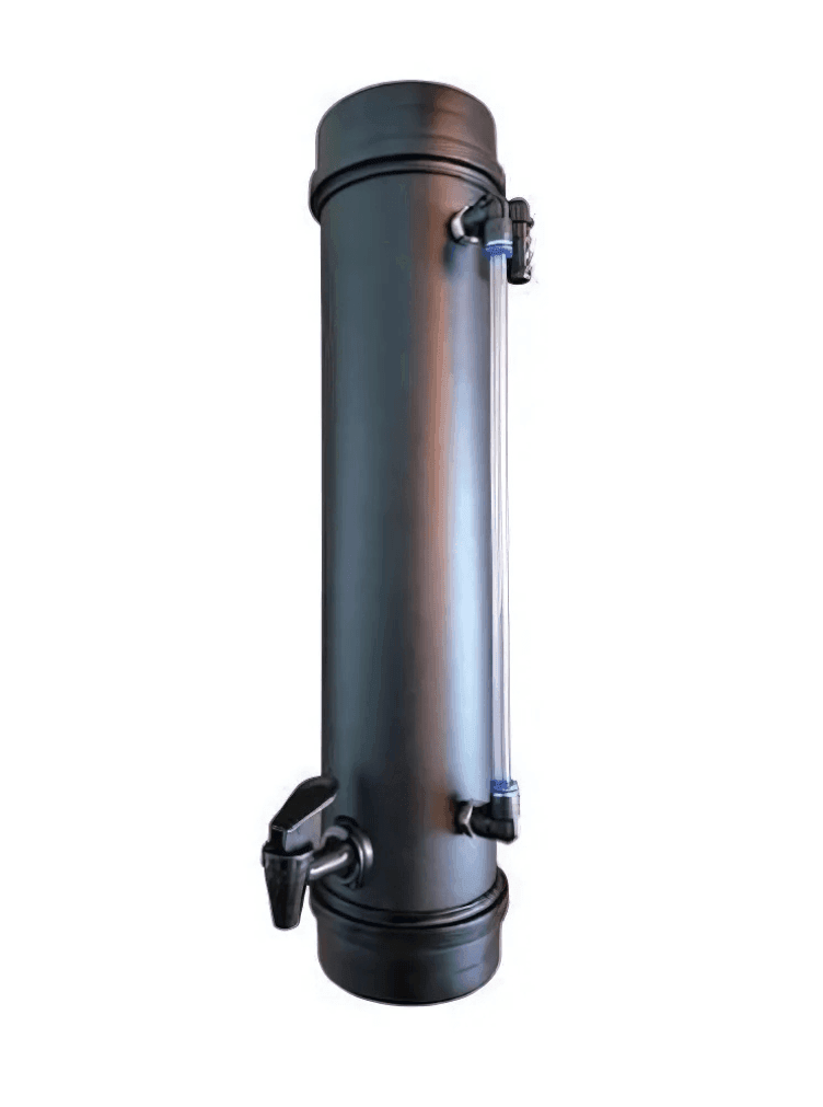 Close-up view of a vertical, cylindrical industrial valve with pipes and a manual control lever.